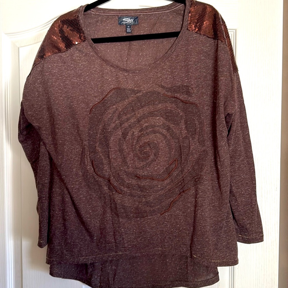 Women’s Silver jeans top
Heathered brown
1X